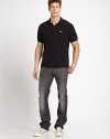 Treated manually to look worn in, a classic design dark wash style. Five pocket styleZip fly and button closureInseam, about 3598% cotton/2% elastaneMachine washImported