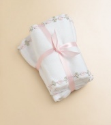 Soft cotton burp pads, decorated with sweet floral vine trim.Includes two padsMachine washCottonImported