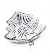 Twinkling in clear glass, the Christmas Night tree dish from Celebrations by Mikasa is just calling for red and green candies or holiday potpourri. A beautiful finishing touch for the coffee or dining table.