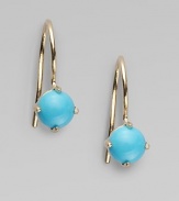 A single drop of sleeping beauty turquoise in a 14K gold setting.Sleeping beauty turquoise 14K gold Width, about 4mm, (.15) French earwires Made in USA 