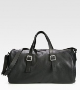 With gym-inspirations, this spacious, versatile carryall is destined to be your weekend travel essential, with exterior and interior pockets, crafted in luxurious, textured leather.Zip closureTop handlesAdjustable shoulder strapExterior, interior zip pocketsFully linedLeather20¾W x 11¾H x 11¾DImported