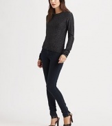 A casual crewneck crafted from nubby melange knit with raised seams for shapring.CrewneckLong sleevesRibbed trimCenter back zipperAbout 22 from shoulder to hem36% wool/28% rayon/27% nylon/5% metallic fibers/4% cashmereDry cleanImported