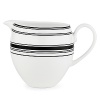 Black bands of varying widths sweeten the proverbial pot in kate spade new york's St. Kitts creamer.