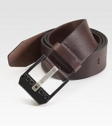 A modern style in smooth leather with a polished logo buckle.LeatherAbout 2½ wideImported