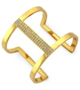 Airy elegance. Vince Camuto's cut-out cuff bracelet is crafted from gold-tone mixed metal with glass crystal accents adding a lustrous touch to the eclectic piece. Approximate diameter: 3-1/2 inches.