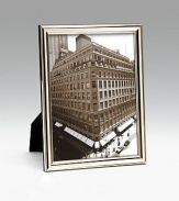 A classic design in sterling silver with beveled edge. Made in Italy