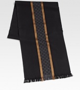 Winter scarf with interlocking GG pattern, stripes and fringe. 13¾W X 71L Silk/wool; dry clean Made in Italy 