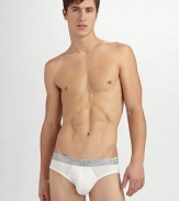 A seamless, body-conscious fit that won't show under clothes, featuring a low rise, contoured pouch and metallic elastic logo waist. 96% modal nylon/4% spandex Machine wash Imported 
