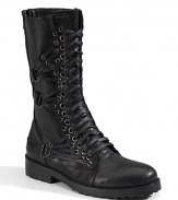 Rugged Italian leather style with a rebellious attitude, accented with graduated metal grommets, multiple laces, edgy buckles and lug soles.Italian leather upper Lace up and back zip closure Leather lining Padded insole Italian leather sole Imported