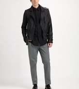 Take a clean break away from the basic flat-front silhouette and transition to this modern update on a pleated trouser, slightly cropped and shaped in smooth, soft cotton.Pleated frontZip flySide slash, back welt pocketsInseam, about 2844% cotton/42% polyester/14% nylonDry cleanImported