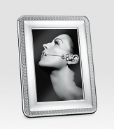 Elegantly appointed, polished silverplated design gives proper attention to a favorite photograph. From the Malmaison Collection A terrific gift idea Wood base Made in FranceDIMENSION INFORMATION4 X 6 (5 X 7 overall)5 X 7 (6 X 8 overall)
