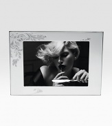 Showcase a favorite photograph in this elegant silverplated frame with etched floral detail. Holds 5X7 photograph Tarnish-proof Dust clean Made in ItalyDIMENSION INFORMATION3 X 4 (4 X 5 overall)4 X 6 (5 X 7 overall)