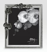 Inspired by the intricacies of natural forms, this graceful frame is richly detailed in cast metal with blackened floral accents. From the Black Orchid CollectionAccommodates a 8 X 10 photoOverall: 10 X 11¾Nickel-plate and blackened nickel-plateImported