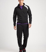 An essential style with sleek reflective details in a tightly-knit polyester for a smooth finish and soft hand.Elastic waist with drawstringAngled zip pocketsZip pockets at the thighsReflective piping on the sidesStraight leg with sewn hemRLX logo detailPolyesterMachine washImported