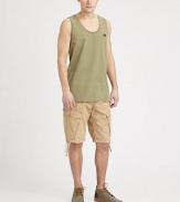 An interesting update on a utilitarian-inspired classic shaped in comfortable, cool cotton with an array of pockets for allover style and versatility.Side slash, back flap pocketsButtoned side cargo pocketsInseam, about 11CottonMachine washImported