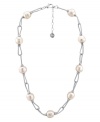 Polish your look with simple elegance. Majorica necklace features Baroque, organic, man-made pearls (14 mm) in a fluid sterling silver setting. Approximate length: 17 inches + 2-inch extender.