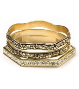 A gold nugget design lends luxe texture to these stacked bangles from Belle Noel.