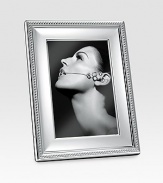 Elegant, finely-polished silverplated design gives proper attention to a favorite 5 X 7 photograph. From the Perles Collection A terrific gift idea Wood base Imported