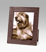 Hand-woven Intrecciato nappa leather gives a favorite photo the presence it deserves. Accommodates a 8 X 10 photograph Overall, 12½ X 10½ Made in Italy