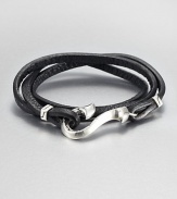 From the Dayak Collection. A strand of rich black leather wraps around the wrist, then closes with a bold sterling silver hook for a look of street-smart elegance.LeatherSterling silverStrap width, about .5Diameter, about 2.5Hook-and-loop closureMade in Bali