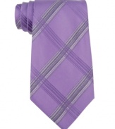 A big bold plaid tie from Calvin Klein makes an instant statement in your dress wardrobe.