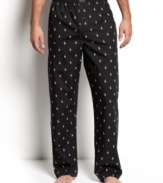 This soft cotton pant is a simple luxury that you should not be without. Relaxed fit with elastic waistband and single button fly. Polo player print all over. Logo appliqué at front waistband.
