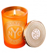 From a uniquely New York collection of scents, this unisex scented candle celebrates the lively charm of Little Italy.  · Blend of mandarin, sweet tangerine, Clementine and musk  · Made of the finest wax and wicks  · In sturdy, tinted glass container  · Gilt metal cap keeps scent from fading 
