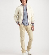 An essential part of any man's wardrobe is cut with classic fit in smooth, easy-wearing cotton chino. Side slash, back welt and flap pockets Inseam, about 34 Cotton Machine wash Imported 