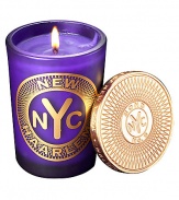 From a uniquely New York collection of scents, this intoxicating scented candle celebrates the legendary history of Harlem.  · Blend of lavender, cedarwood, coffee, vanilla, patchouli  · Made of the finest wax and wicks  · In sturdy, tinted glass container  · Gilt metal cap keeps scent from fading 