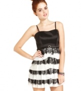 With its fluttery tiers of pleats and lace, Sequin Hearts' spaghetti strap dress creates the prettiest party style.