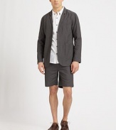 Lightweight jacket with oversized pocket details for added versatility and comfort.ButtonfrontChest welt, waist patch pocketsPartially linedAbout 28 from shoulder to hemCottonDry cleanImported