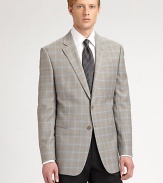 Richly tailored dress essential in modern silhouette rendered in fine Italian wool.Two-button closureNotch lapelChest, waist welt pocketsSide ventsAbout 30 from shoulder to hemWoolDry cleanMade in Italy