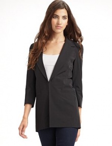 THE LOOKNotched collar Hook-and-eye front Seamed, padded shoulders ¾ sleeves with five button cuffs Welt pockets at chest and hips Back vented hemTHE FITAbout 28 from shoulder to hemTHE MATERIAL95% polyester/5% elastaneCARE & ORIGINDry clean Imported THE LOOKNotched collar Hook-and-eye front Seamed, padded shoulders ¾ sleeves with five button cuffs Welt pockets at chest and hips Back vented hemTHE FITAbout 28 from shoulder to hemTHE MATERIAL95% polyester/5% elastaneCARE & ORIGINDry clean Imported