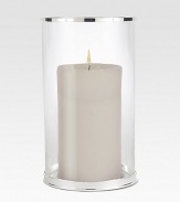 Elegant in its simplicity, a crystal column with silver-plated accents is ready to shed softly glowing candlelight. Candle not included 11H X 6D Imported