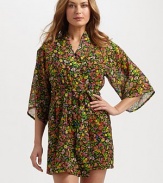 A semi-sheer wrap imparts thoughts of spring with a lush floral print. Three-quarter sleevesSelf-tie waistAbout 35 from shoulder to hemPolyesterMachine washImported