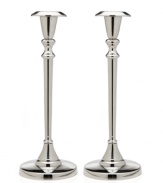 Cast your home in a more beautiful light with Godinger candlesticks. A classic tulip shape defines a polished aluminum pair to accentuate any setting.