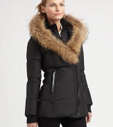 Featuring a natural Asiatic raccoon fur-trimmed hood, a cropped puffer jacket with the unmistakable style of Mackage.Fur-trimmed hoodRibbed cuffsZipper closureSlash pocketsFully linedAbout 30 from shoulder to hemBody: polyesterFill: down feathers/other feathersDry clean by fur specialistImportedFur origin: Finland Model shown is 5'10½ (179cm) wearing US size Small. 