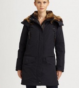 Featuring a convenient hood trimmed in plush faux fur, this iridescent puffer coat offers luxurious warmth.Attached hoodSignature arm patchConcealed zipper frontZip and flap pocketsZip-out liningAbout 33 from shoulder to hemPolyamideMachine washImported Model shown is 5'11 (180cm) wearing US size Small. 