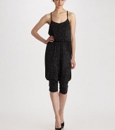 Easy and unconventional one piece rendered in modern glitter for a glamorous twist.Scoop neckline Adjustable shoulder straps Elastic waist Inverted ankle pleats Fully lined About 60 from shoulder to hem 94% acetate/6% elastane Dry clean Made in USA