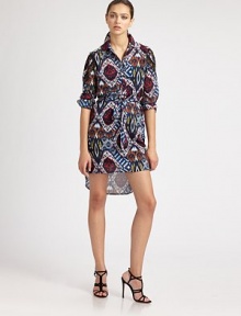 This classic shirtdress silhouette is printed with a colorful, batik-inspired pattern.Shirt collarButton frontLong sleeves with lace insets and button cuffsSelf tie beltCurved hemlineInverted back pleatFully linedAbout 27 from natural waistPolyesterDry cleanMade in USA of imported fabricModel shown is 5'11 (180cm) wearing US size 4. This classic shirtdress silhouette is printed with a colorful, batik-inspired pattern.Shirt collarButton frontLong sleeves with lace insets and button cuffsSelf tie beltCurved hemlineInverted back pleatFully linedAbout 27 from natural waistPolyesterDry cleanMade in USA of imported fabricModel shown is 5'11 (180cm) wearing US size 4.