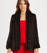This textured, faux fur jacket is vintage-inflected for an uptown look. Shawl collarLong sleevesRoll cuffsHook-and-eye closureFully linedAbout 26 from shoulder to hemViscose/cotton/modalDry cleanImported Model shown is 5'10 (178cm) wearing US size Small. 