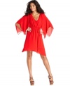 Dance the night away in Cha Cha Vente's sultry red wrap dress - the batwing sleeves add a dose of drama!