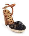 Cork and jute accents make the Sam Edelman Rella sandals a unique summer standout, while a chunky block heel fits right in with the season's footwear trends.