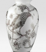 Like a beautiful Japanese screen translated to fine bone china, this graceful, urn-shaped vase presents a meticulously rendered peacock surrounded by lush flowers in soft shades of plum and platinum, embellished with hand-set amethyst-tinted Swarovski crystals.Bone chinaCrystals17H X 10W X 7.5DHand washImported