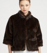 A perfectly plush, cropped faux fur design with stand-up collar and bell sleeves has old-school glam charm.Stand-up collarBracelet-length bell sleevesFront hook closureVelvet-lined side pocketsAbout 22 from shoulder to hemFully linedAcrylicDry cleanMade in USA of imported fabric