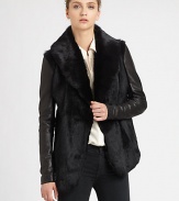 Crafted from plush rabbit fur, this glamorous coat has an emphasized shawl collar and gleaming leather sleeves. Shawl collarHook-and-eye closureLong leather sleevesSlash pocketsSilk liningAbout 27 from shoulder to hemBody: Dyed rabbit fur; Contrast: LeatherDry clean with leather specialistImportedFur origin: ChinaModel shown is 5'10 (177cm) wearing US size Small.