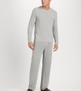 A soft loungewear classic with a silky finish, relaxed fit and preeminent comfort. Crewneck Long sleeves 90% modal/10% elastane; machine wash Imported 