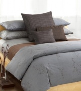 A tranquil fern pattern in plum and pewter brings a sophisticated natural touch to this duvet. Made of vat-dyed Italian cotton with hidden button closure. Reverses easily to fit any slumbering mood.