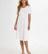 Luxurious versatility in a classic silhouette created from long-staple Egyptian Giza cotton, mercerized for ultra softness and a natural sheen.ScoopneckPartial button-front placketShort sleevesUnderstated, shaped styleMercerized Egyptian Giza cotton interlockMachine washImportedAdditional Information Women's Modern Size Guide 