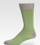 Super soft, with a hint of stretch in neatly striped cotton knit.Mid-calf height80% cotton/20%nylonMachine washImported